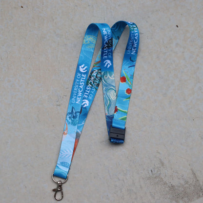 MANY VOICES, ONE COMMUNITY LANYARD